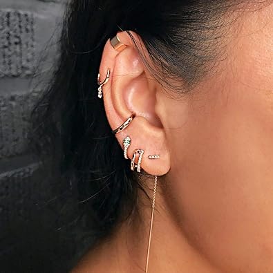 Gold huggie snake earrings
